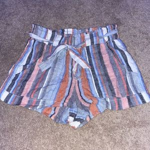 Stripped 5inch shorts, with cute tie in front! Pockets on the side!